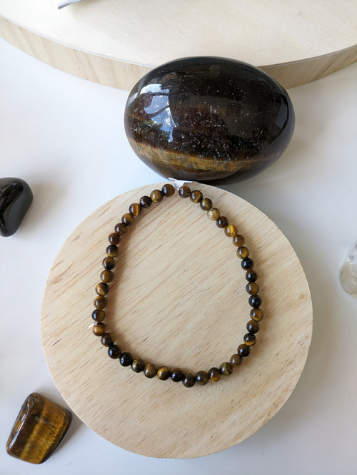 Bracelet uni en oeil de tigre 4mm- taille unique
